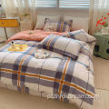 Frenha de cama de lençol acadêmico na cama de cama de cama